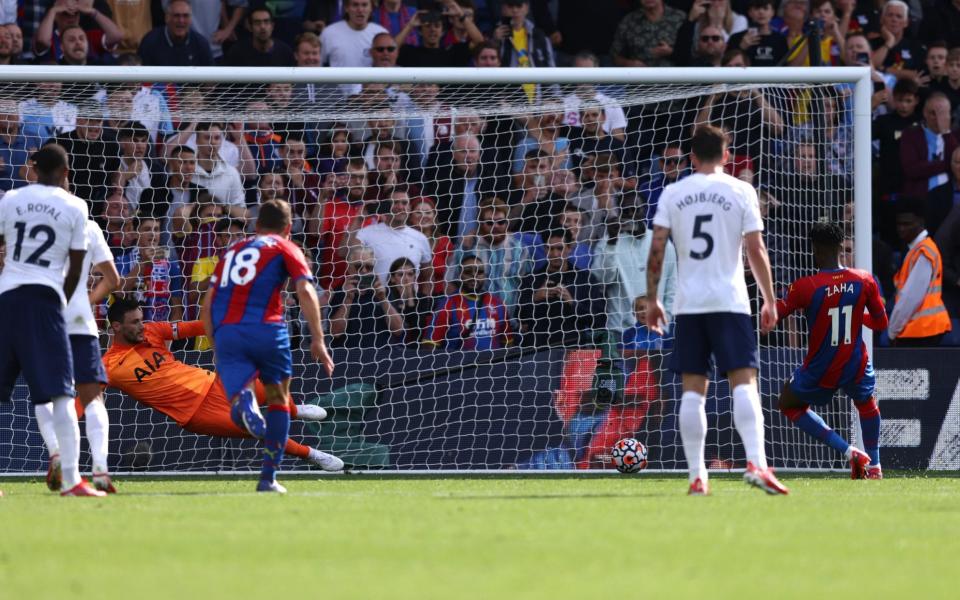 Wilfried Zaha of Crystal Palace scores their side's first goal - Paul Harding/Getty Images
