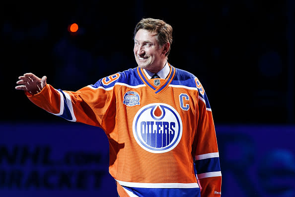 EDMONTON, AB - APRIL 6: Former Edmonton Oilers forward Wayne Gretzky greets fans during the closing ceremonies at Rexall Place following the game between the Edmonton Oilers and the Vancouver Canucks on April 6, 2016 at Rexall Place in Edmonton, Alberta, Canada. The game was the final game the Oilers played at Rexall Place before moving to Rogers Place next season. (Photo by Codie McLachlan/Getty Images)