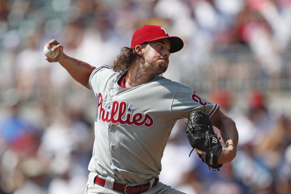 Philadelphia Phillies starting pitcher Aaron Nola (27) delivers in the first inning of a baseball game against the Atlanta Braves Thursday, Sept. 19, 2019, in Atlanta. (AP Photo/John Bazemore)