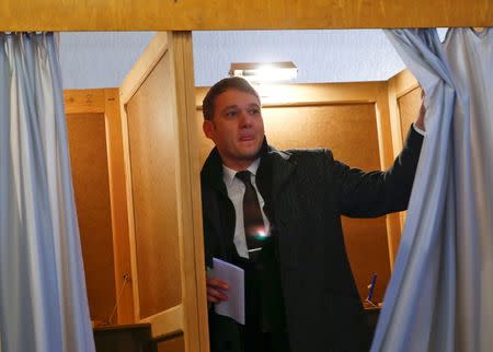 Andre Poggenburg of the right-wing Alternative for Germany (AFD) leaves the voting booth in the town of Stoessen in Saxony-Anhalt, Germany, March 13, 2016. REUTERS/Wolfgang Rattay