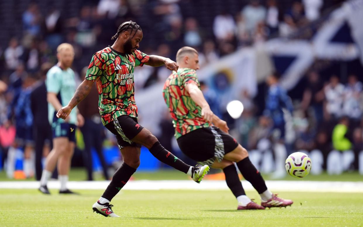 Raheem Sterling warms up