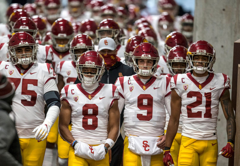 SALT LAKE CITY, UT - NOVEMBER 21: Alijah Vera-Tucker #75, Amon-Ra St. Brown #8, Kedon Slovis.