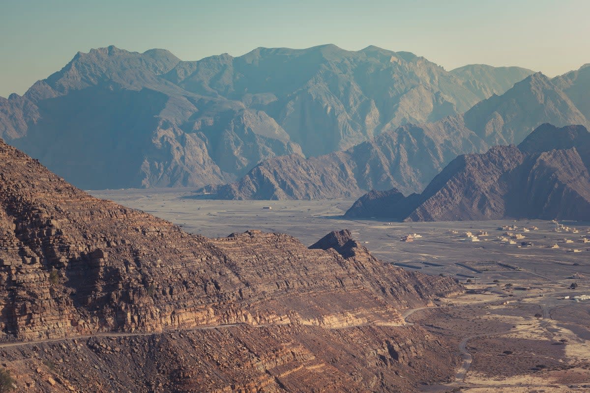 The Hajar Mountains stretch for over 400 miles through Oman and the UAE (Getty Images)