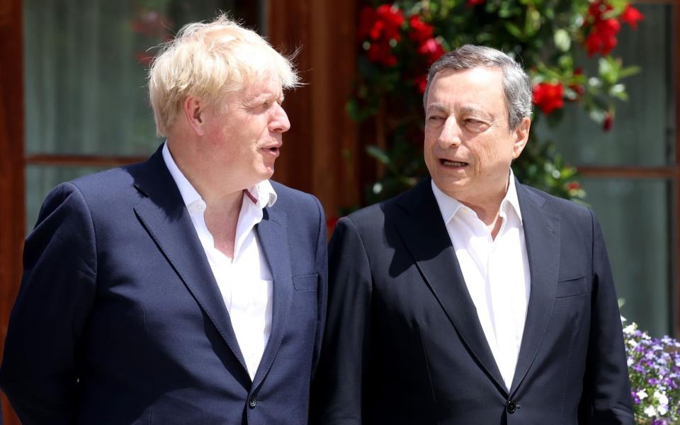 Boris Johnson and Mario Draghi, the Italian Prime Minister, chat at the G7 summit in southern Germany - Liesa Johannssen-Koppitz/Bloomberg 