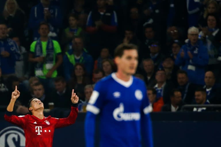 Colombia midfielder James Rodriguez (L) celebrates scoring for Bayern Munich in their 2-0 win over Schalke on Saturday at Gelsenkirchen's Veltins Arena