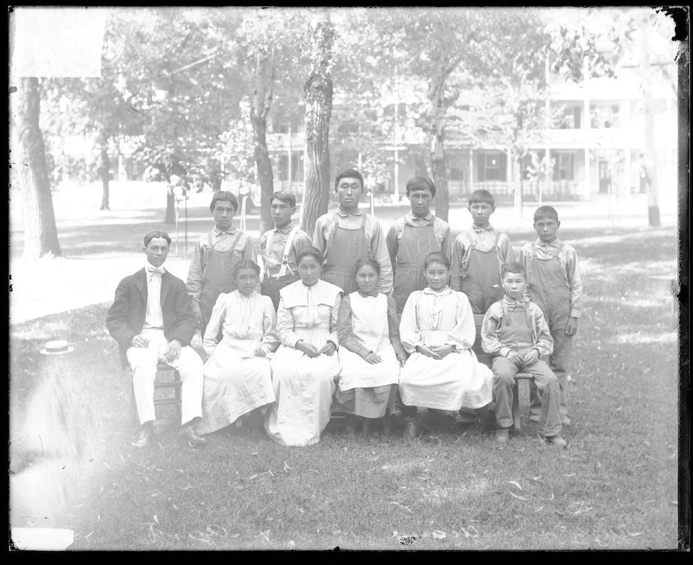 Anastasia Ashouwak (bottom row, third from right) was one of 11 Alaska Native orphans taken by an Indian agent (far left with bowtie) in 1901 from Woody Island in Alaska to the Carlisle Indian Industrial School in Pennsylvania. (Photo: Courtesy Lara Ashouwak)  