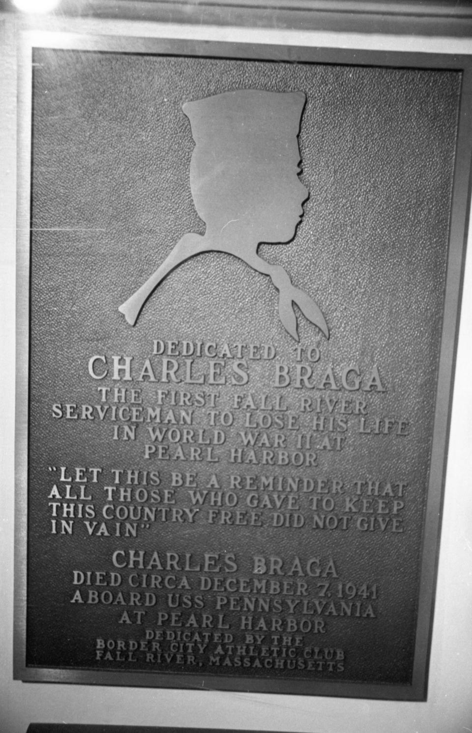 A plaque dedicated to Charles Braga is located at Battleship Cove in 1984.