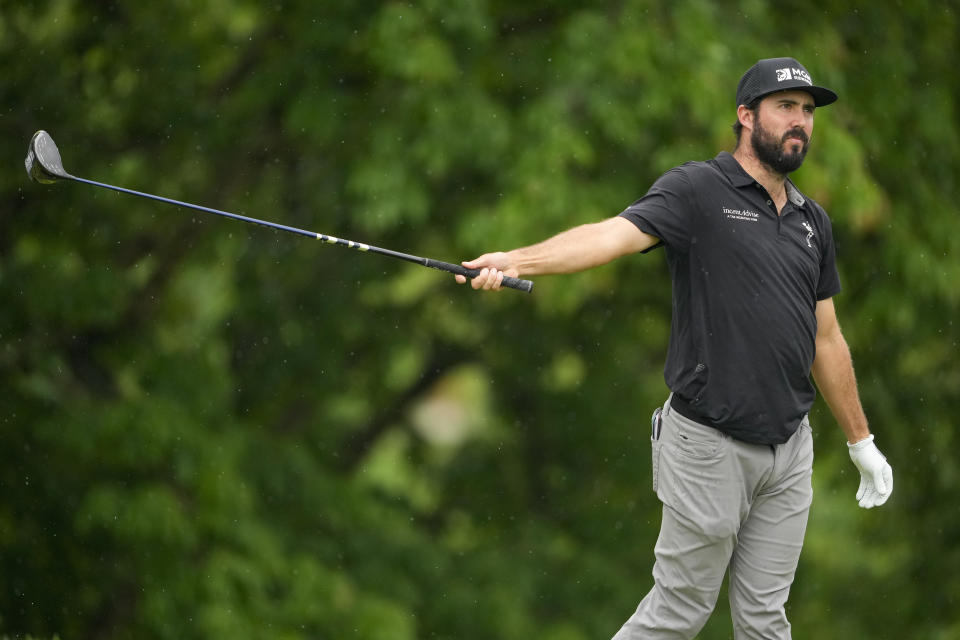 Mark Hubbard watches his tee shot on the 18th hole during the second round of the PGA Championship golf tournament at the Valhalla Golf Club, Friday, May 17, 2024, in Louisville, Ky. (AP Photo/Matt York)