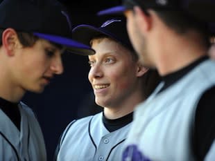 James Fuller smiles in the dugout — Chicago Sun-Times