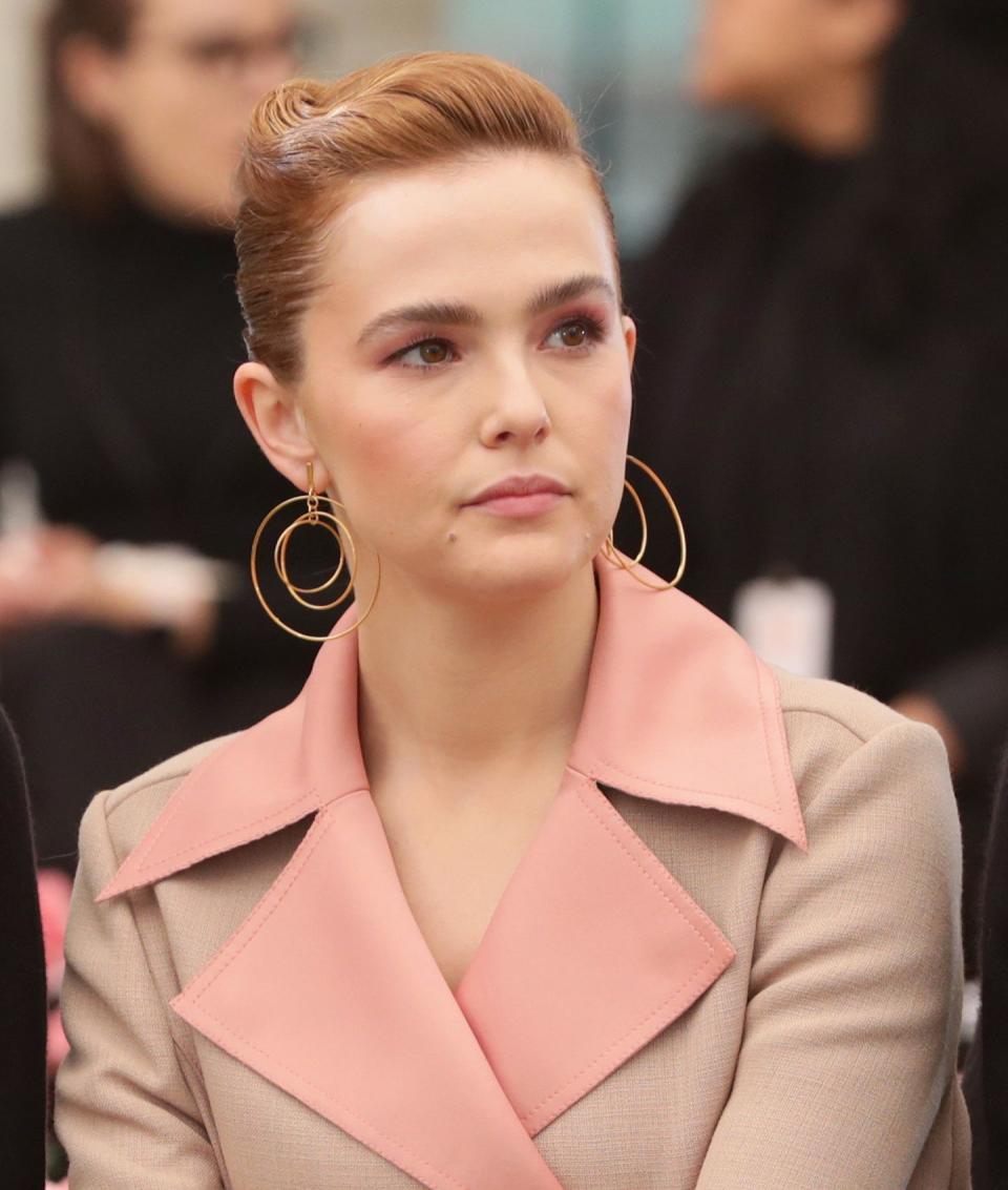 During New York Fashion Week in February 2018, Zoey Deutch complemented the pink lapel on her coat with <a href="http://people.com/style/nyfw-fw-2018-best-beauty-looks/tory-burch" target="_blank">a matching pink makeup look</a> that was bold, but not over the top.