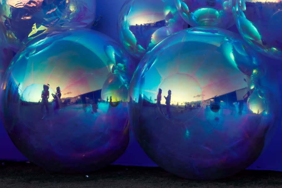 INDIO, CALIFORNIA – APRIL 14: (FOR EDITORIAL USE ONLY) Festivalgoers attend the 2024 Coachella Valley Music and Arts Festival at Empire Polo Club on April 13, 2024 in Indio, California. (Photo by Frazer Harrison/Getty Images for Coachella)