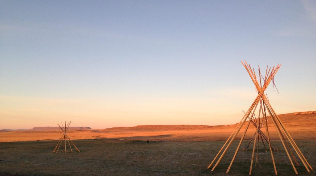 The golden hue of a sunset at First Peoples Buffalo Jump State Park