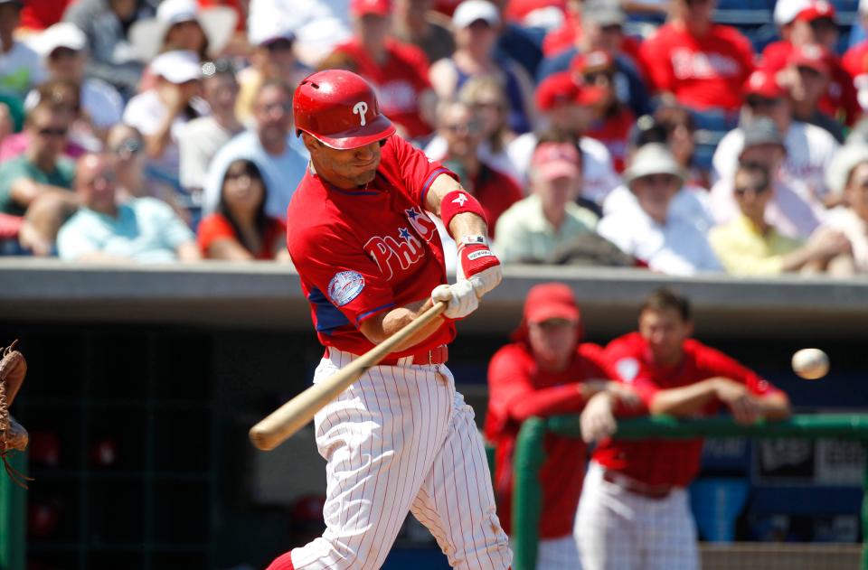 Philadelphia Phillies third baseman Russ Canzler (68) hits a solo home run during the sixth inning against the Detroit Tigers on Sunday at Bright House Field in Clearwater, Fla.