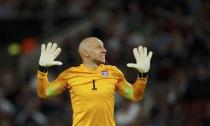 Brad Guzan of the U.S. gestures during their international friendly soccer match against Germany in Cologne, Germany June 10, 2015. REUTERS/Ina Fassbender