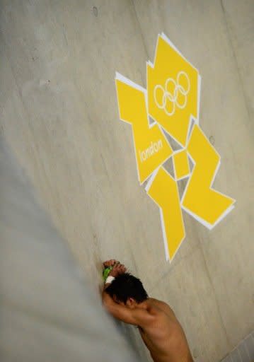 China's Qiu Bo reacts after he finished second in the men's 10m platform final at the London 2012 Olympic Games on August 11. Newly-crowned Olympic diving champion David Boudia says the world is coming after China following his sensational upset of Chinese superstar Qiu Bo in a titanic 10m platform final on Saturday