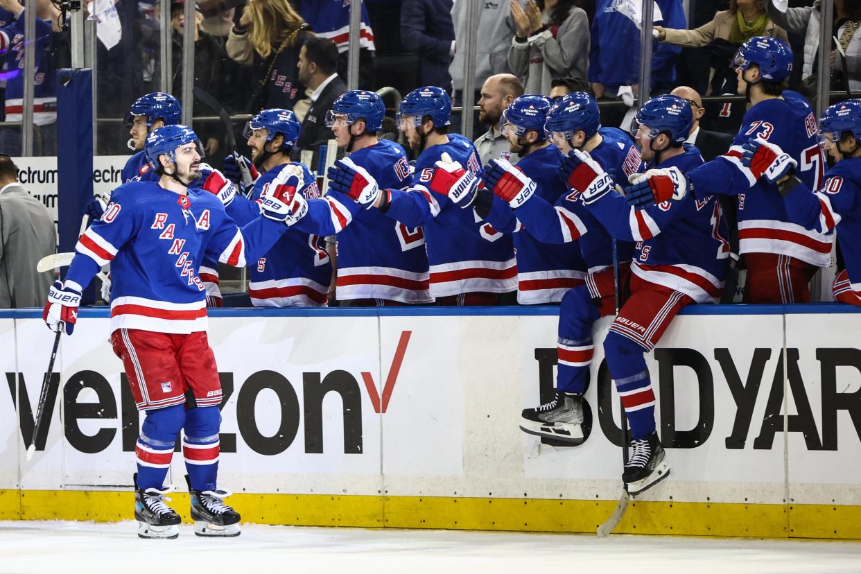 Apr 21, 2024; New York, New York, USA; New York Rangers left wing Chris Kreider (20) celebrates with his teammates after scoring a goal in the third period against the Washington Capitals in game one of the first round of the 2024 Stanley Cup Playoffs at Madison Square Garden. Mandatory Credit: Wendell Cruz-USA TODAY Sports