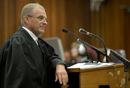 Gerrie Nel questions Wayne Derman, a sports physician. (AP)