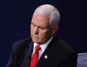 SALT LAKE CITY, UTAH - OCTOBER 07: A fly briefly lands on head of U.S. Vice President Mike Pence during in the vice presidential debate against Democratic vice presidential nominee Sen. Kamala Harris (D-CA) at the University of Utah on October 7, 2020 in Salt Lake City, Utah. The vice presidential candidates only meet once to debate before the general election on November 3. (Photo by Alex Wong/Getty Images)