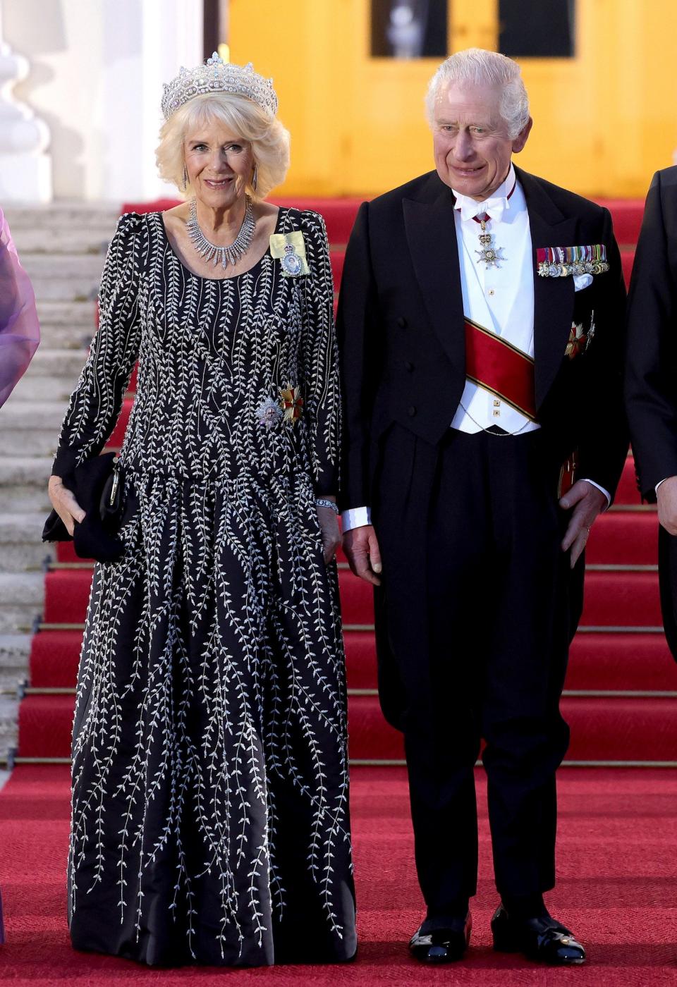 King Charles III and Camilla, Queen Consort pose at The Bellevue Palace ahead of a State Banquet on March 29, 2023 in Berlin bruce oldfield gown - Getty