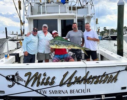 The winning boat and crew from the 2023 Offshore Challenge: Jason Larkin, Don Withers, Billy Tarver, Ernie Endicott, Scott Gosney