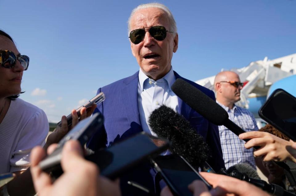 President Joe Biden speaks to members of the media after exiting Air Force One, Wednesday, July 20, 2022, at Andrews Air Force Base, Md. Biden has tested positive for COVID-19 on Thursday, July 21, making him the second U.S. president to get the virus. (AP Photo/Evan Vucci, File)