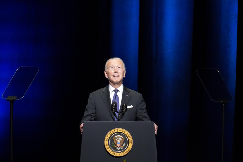 President Joe Biden looks up as he speaks during a memorial service for former Senate Majority Leader Harry Reid at the Smith Center in Las Vegas, Saturday, Jan. 8, 2022. (AP Photo/John Locher)