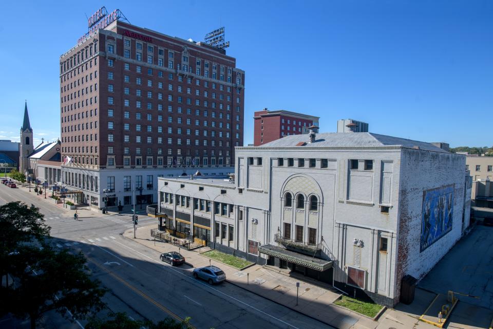 The historic Madison Theater sits at the corner of Main Street and NE Madison Avenue across from the historic Marriott Pere Marquette Hotel in Downtown Peoria.