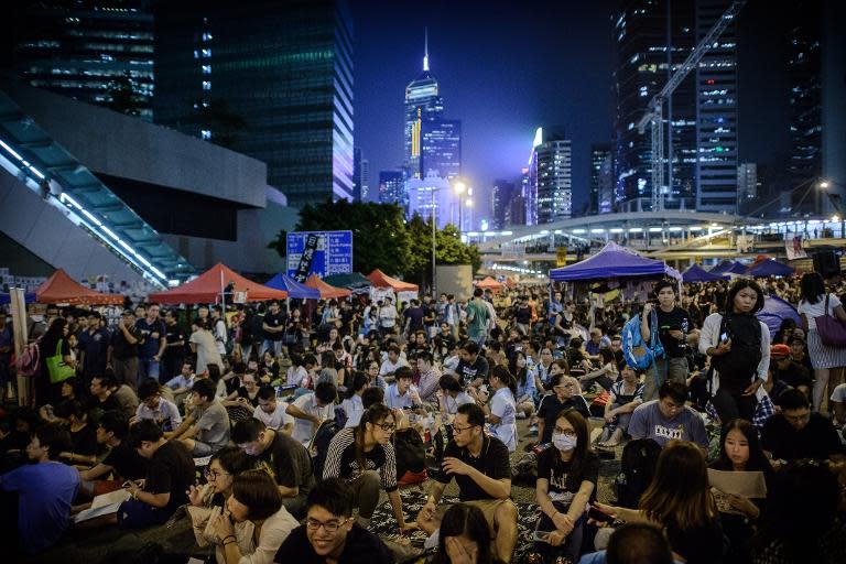 Pro-democracy demonstrators gather for a rally in Hong Kong on October 10, 2014