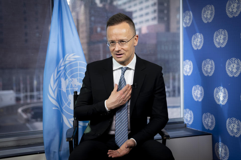 Peter Szijjarto, Minister of Foreign Affairs of Hungary, is interviewed by The Associated Press, Friday, March 24, 2023, at United Nations headquarters. Szijjarto said Friday that his country has not voted on whether to allow Finland and Sweden to join NATO because Hungarian lawmakers are sick of those countries' critiques of Hungarian domestic affairs. (AP Photo/John Minchillo)