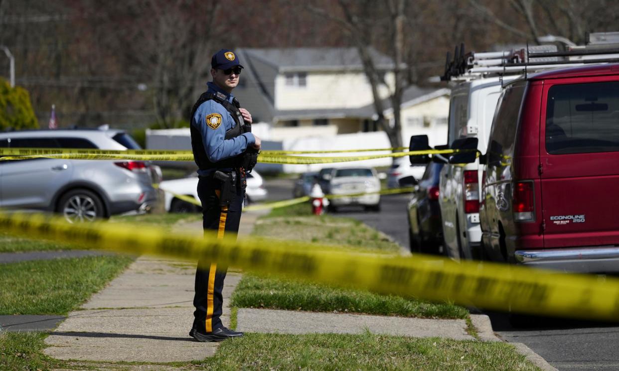 <span>Police respond to a shooting in Levittown, Pennsylvania, on Saturday.</span><span>Photograph: Matt Rourke/AP</span>