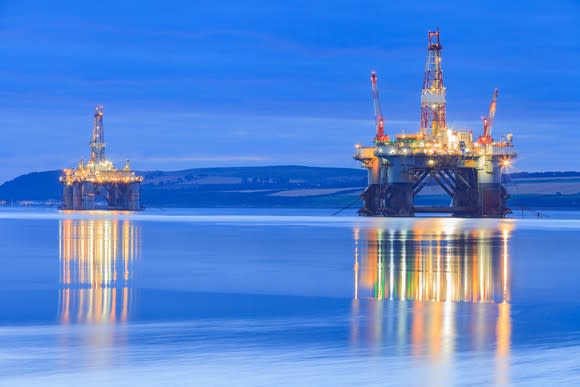 Offshore oil rigs at night.