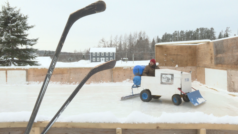 This lawn mower-powered mini-Zamboni is about as Canadian as it gets