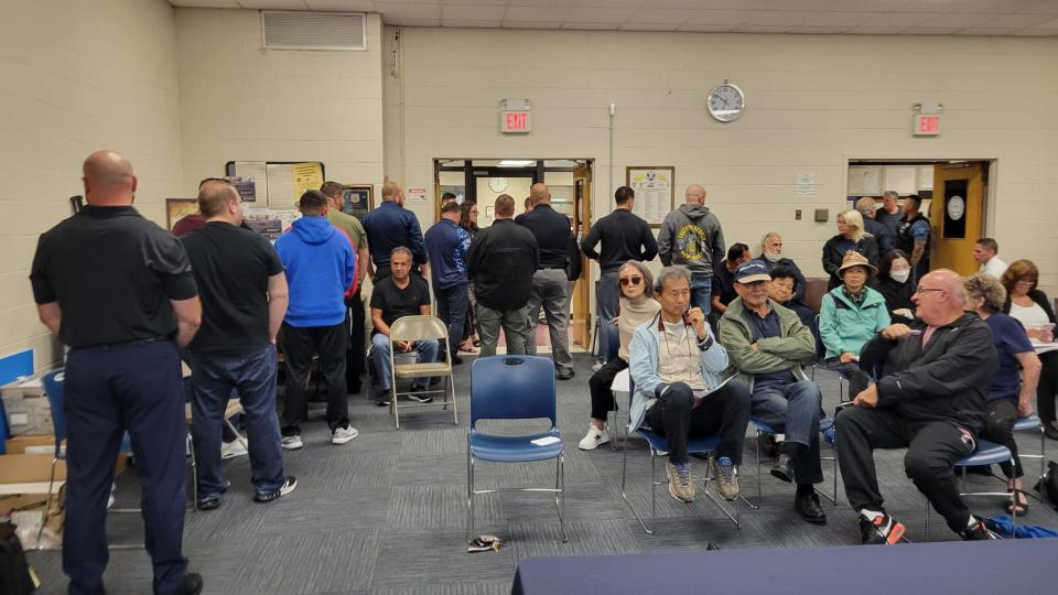 Several Palisades Park police officers turned their back to the mayor after delays in mold remediation where officers and other borough employees have reported getting sick.