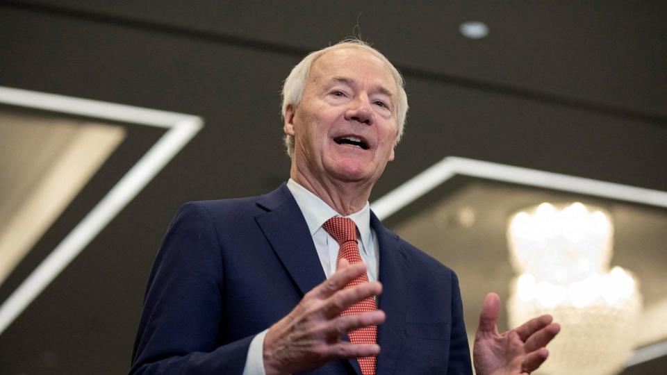 PHOTO:  Former Arkansas governor and 2024 Presidential candidate Asa Hutchinson speaks to media following the Republican Party of Iowa legislative breakfast at the Hilton Des Moines Downtown, in Des Moines, Iowa, on Jan. 8, 2024. (Alyssa Pointer/Reuters, FILE)