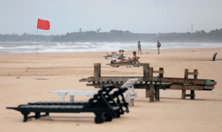 Empty sunbathing chairs are seen on a beach near hotels in a tourist area in Bentota, Sri Lanka May 2, 2019. REUTERS/Dinuka Liyanawatte