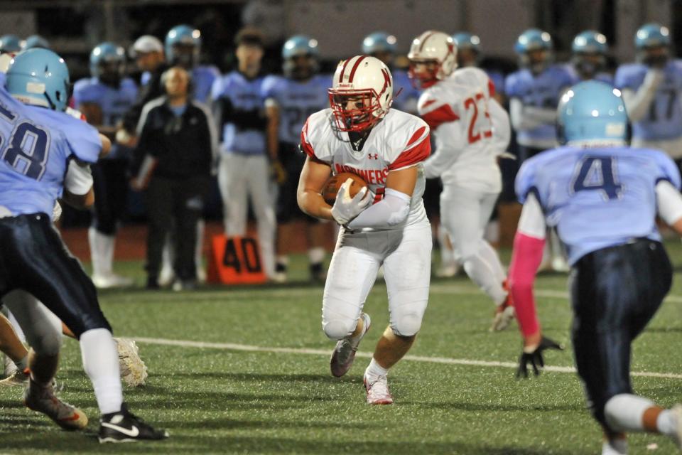 Narragansett's Reider Fry (shown in action earlier this season) had two touchdowns in the third quarter to help the Mariners break away from Johnston and come away with a 48-20 win in their Division III semifinal Friday night.