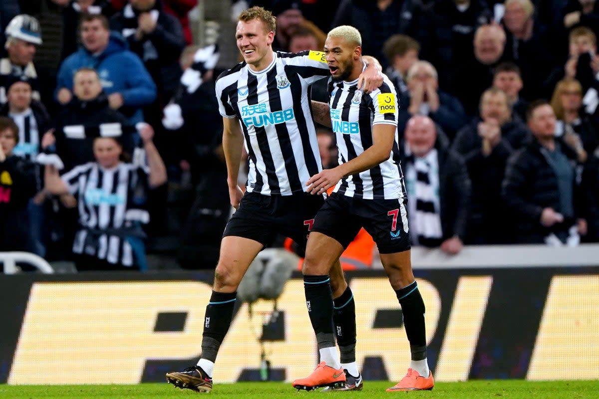 Dan Burn, left, celebrates with fellow goalscorer Joelinton (Owen Humphreys/PA) (PA Wire)