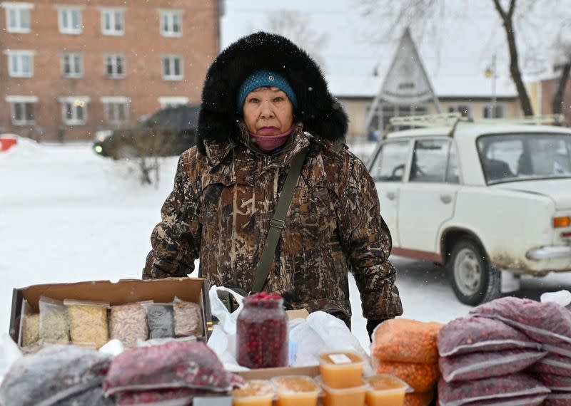 Pensioner Gulsina Zhemaletdinova poses for a picture in the Siberian town of Tara