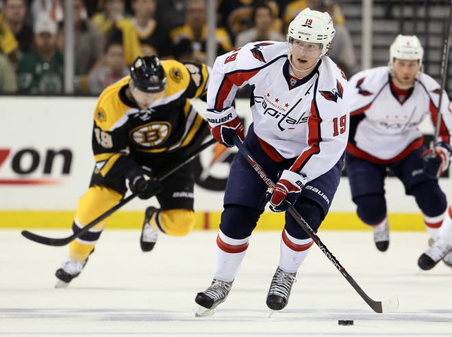 BOSTON, MA - APRIL 14: Nicklas Backstrom #19 of the Washington Capitals takes the puck in the second period as Rich Peverley #49 of the Boston Bruins defends in Game Two of the Eastern Conference Quarterfinals during the 2012 NHL Stanley Cup Playoffs at TD Garden on April 14, 2012 in Boston, Massachusetts. (Photo by Elsa/Getty Images)