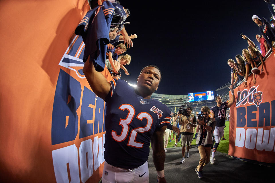 CHICAGO, IL - AUGUST 08: Chicago Bears running back David Montgomery (32) celebrates with Chicago Bears fans after game action during a NFL preseason game between the Carolina Panthers and the Chicago Bears on August 8, 2019 at Soldier Field, in Chicago, IL. (Photo by Robin Alam/Icon Sportswire via Getty Images)