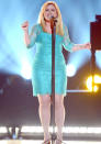 Celebrities in pastel fashion: Kelly Clarkson wowed on stage at the ACMAs in a pastel turquoise dress.<br><br>© Getty