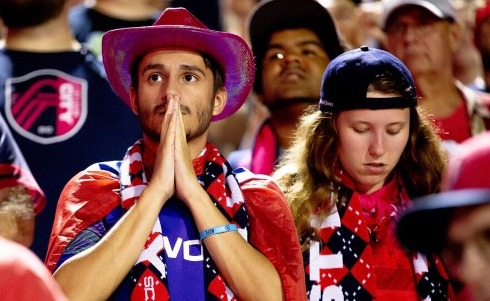 John Hoffman, 20, of Belleville, prays as he watches St. Louis City 2 on Aug. 6 during a matchup against Chicago Fire 2 at Ralph Korte Stadium in Edwardsville.