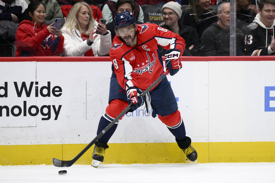 Washington Capitals left wing Alex Ovechkin passes the puck during the second period of the team's NHL hockey game against the St. Louis Blues, Thursday, Jan. 18, 2024, in Washington. (AP Photo/Nick Wass)