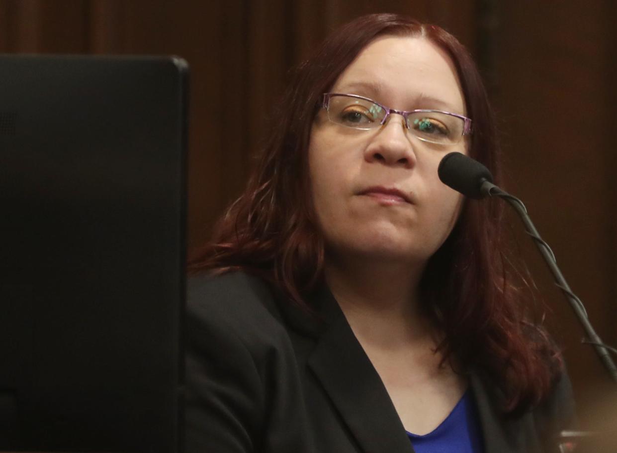 Clinical psychologist Sylvia O'Bradovich of Summit Psychological Services in Akron listens to a question from Assistant Summit County Prosecutor Brian Stano during the Sydney Powell trial in Summit County Common Pleas Judge Kelly McLaughlin's courtroom. Powell is on trial for the stabbing death of her mother.