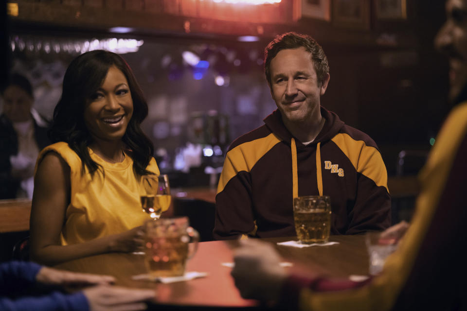 This image released by Apple TV+ shows Gabrielle Dennis, left, and Chris O’Dowd in a scene from "The Big Door Prize." (Apple TV+ via AP)