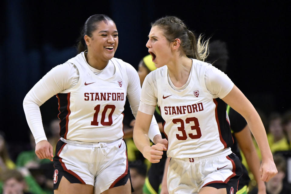 Stanford guard Talana Lepolo (10) and guard Hannah Jump react after a 3-point basket against Oregon during the first half of an NCAA college basketball game in the quarterfinals of the Pac-12 women's tournament Thursday, March 2, 2023, in Las Vegas. (AP Photo/David Becker)