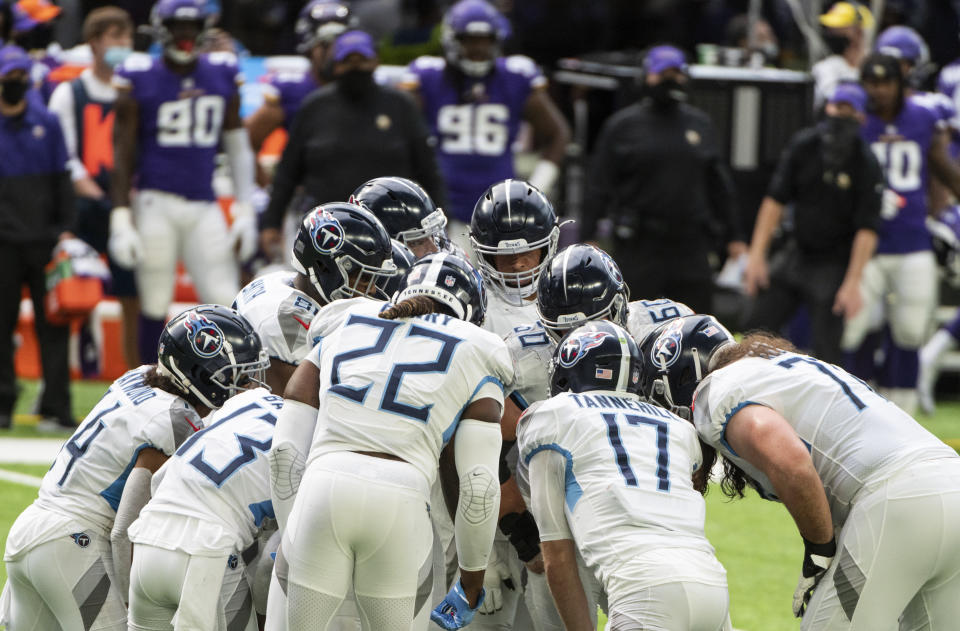 MINNEAPOLIS, MN - SEPTEMBER 27: Tennessee Titans players huddle in the second quarter of the game against the Minnesota Vikings at U.S. Bank Stadium on September 27, 2020 in Minneapolis, Minnesota. (Photo by Stephen Maturen/Getty Images)