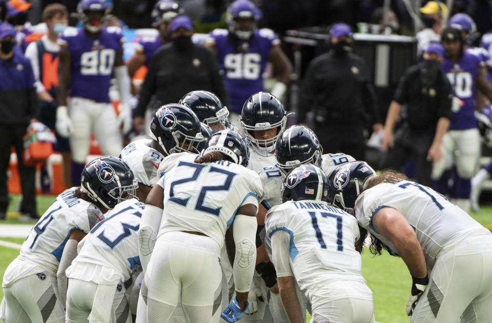 Tennessee Titans players huddle against the Minnesota Vikings on Sept. 27.