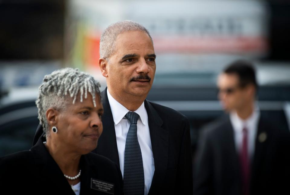 Former Attorney General Eric Holder arrives for the funeral of Rep. Elijah Cummings, D-Md., at the New Psalmist Baptist Church in Baltimore, on Oct. 25, 2019.