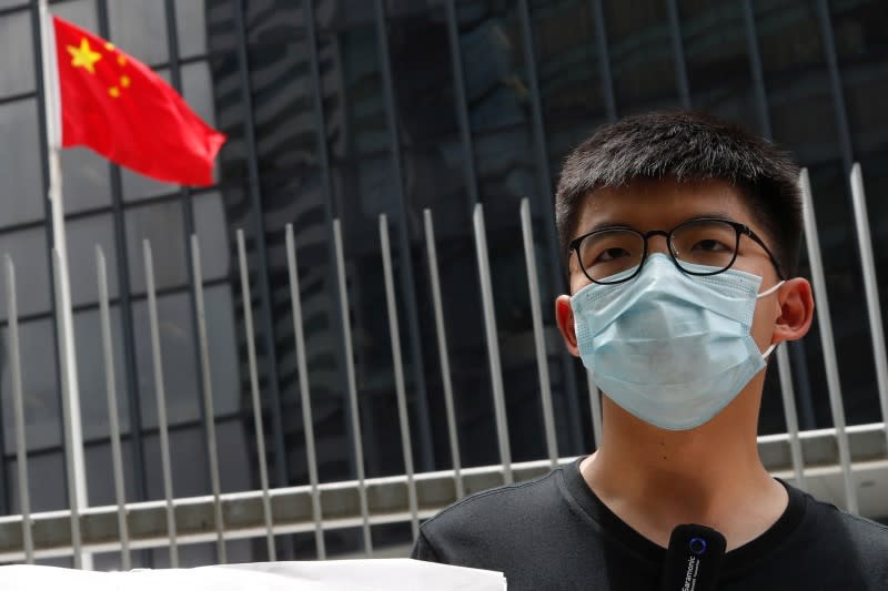 Pro-democracy activist Joshua Wong speaks to the media in response to the national security legislation in Hong Kong